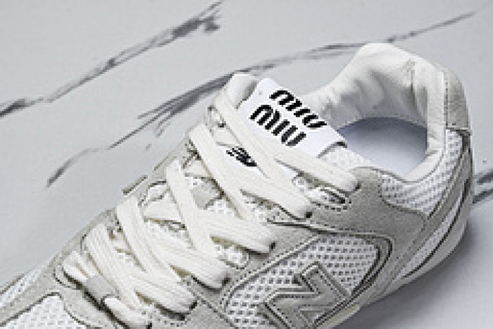 New Balance Mi­u