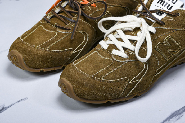 New Balance Mi­u